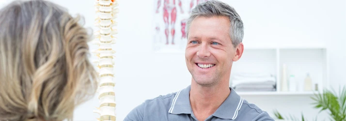 Chiropractic Kingwood TX Man with Spine Model
